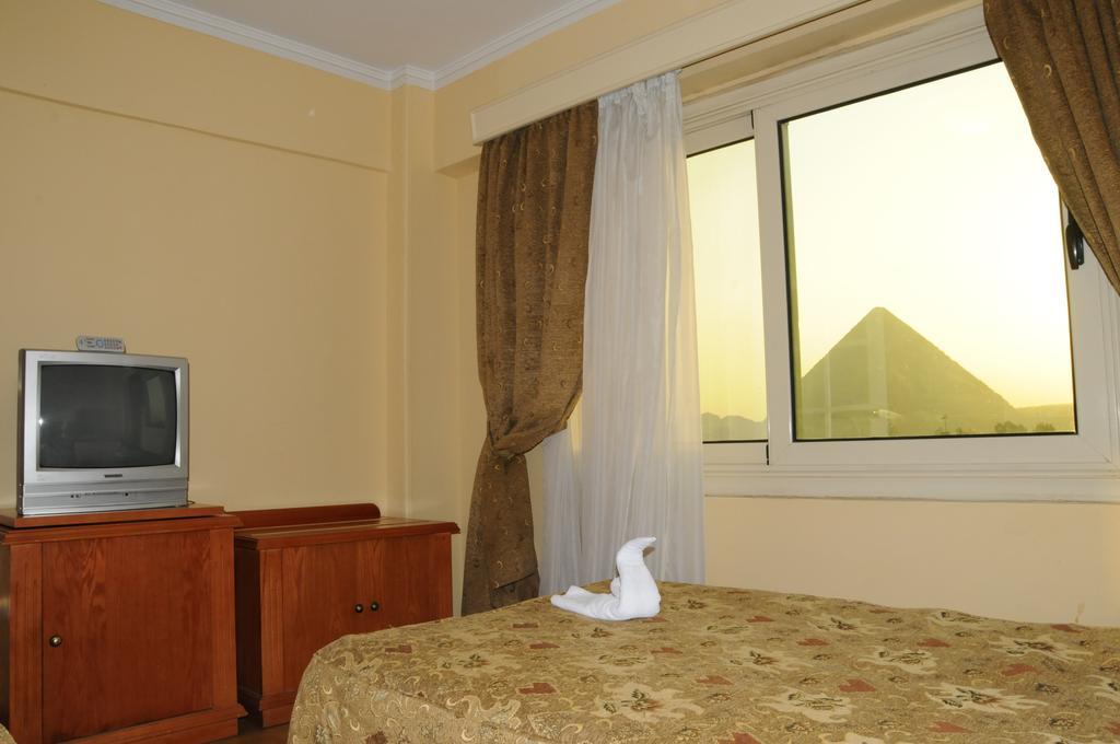 Tiba Pyramids Hotel Giza Quarto foto