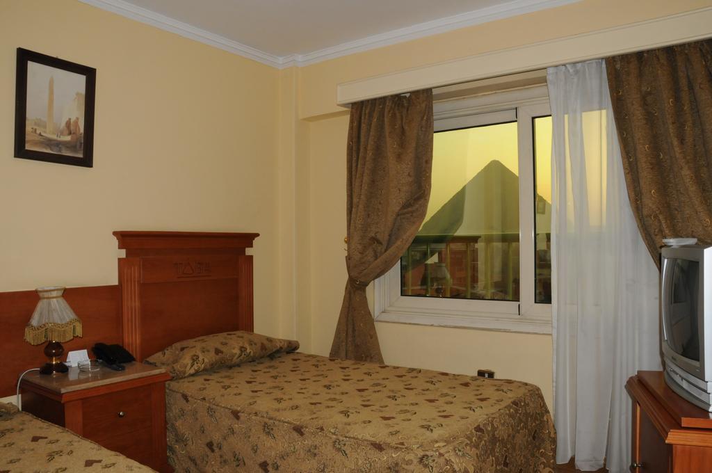 Tiba Pyramids Hotel Giza Quarto foto